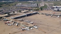 Tulsa Airport installs electric vehicle charging stations in a parking garage