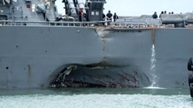 John S McCain to be taken to Japan for damage assessment
