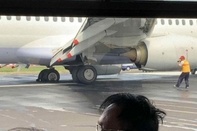 China Airlines Boeing 737 Bursts Both Left Main Tyres on Landing